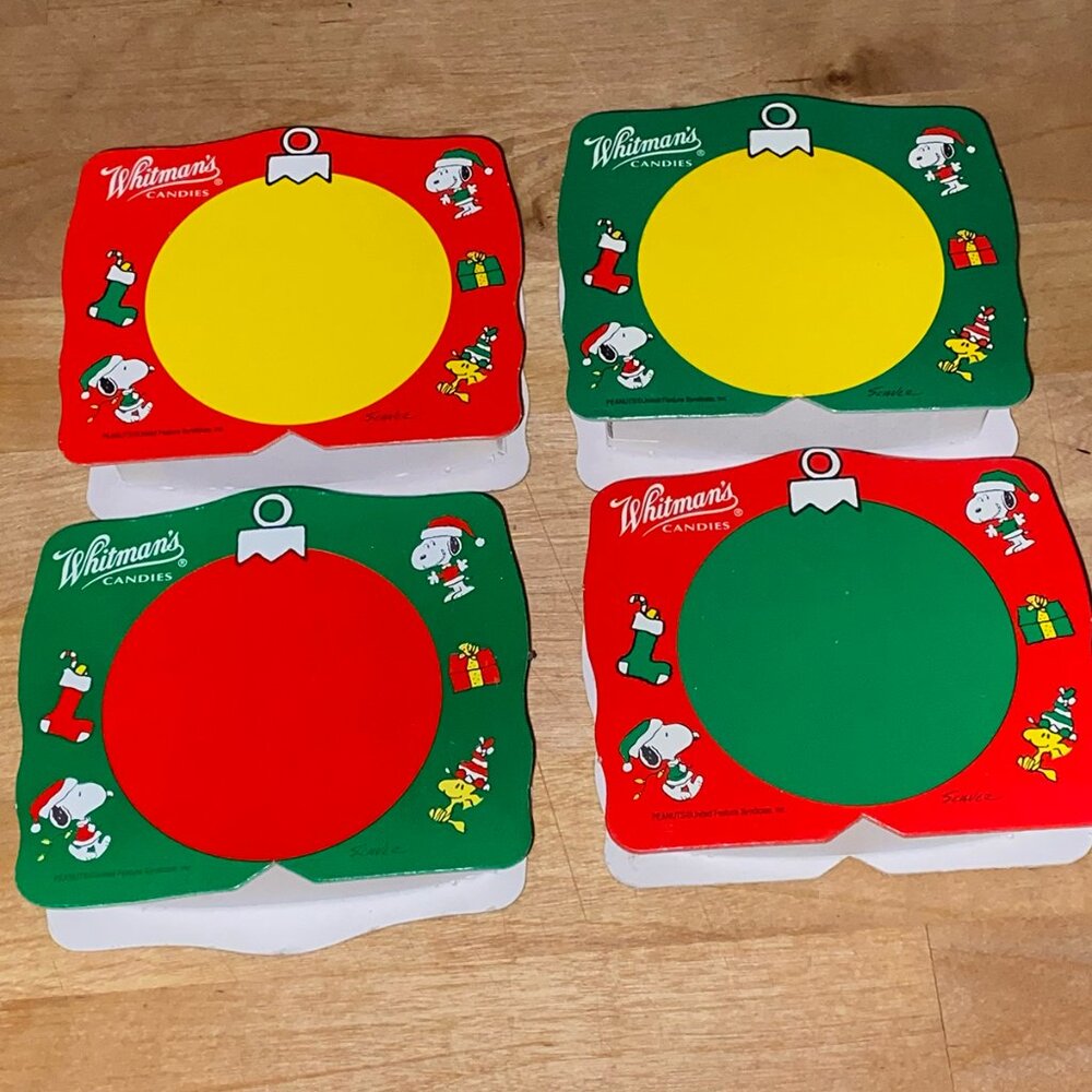 Collection of Four Peanuts Snoopy Christmas Holiday Whitman Candy Boxes
